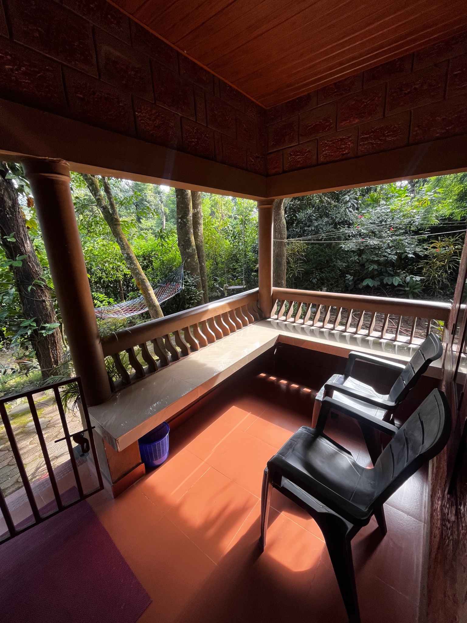 Treehouse veranda surrounded by forest